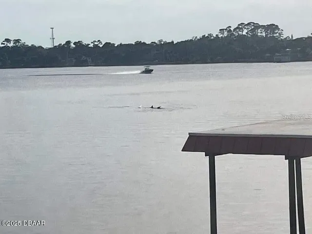 a view of a balcony with chairs