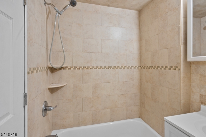 136 Smith Street Elizabeth, NJ 07201 - Photo 20 of 38 a bathroom with a shower