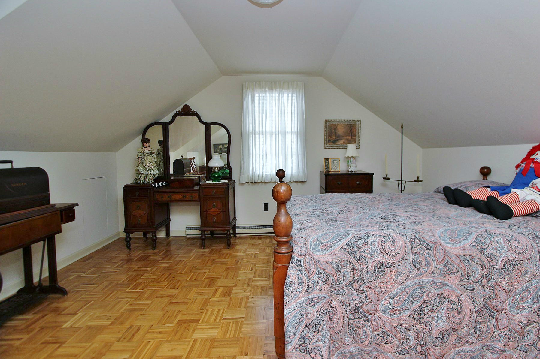 1131 Quarles Road Thaxton, VA 24174 - Photo 47 of 58 a large bed sitting in a bedroom next to a computer on a desk