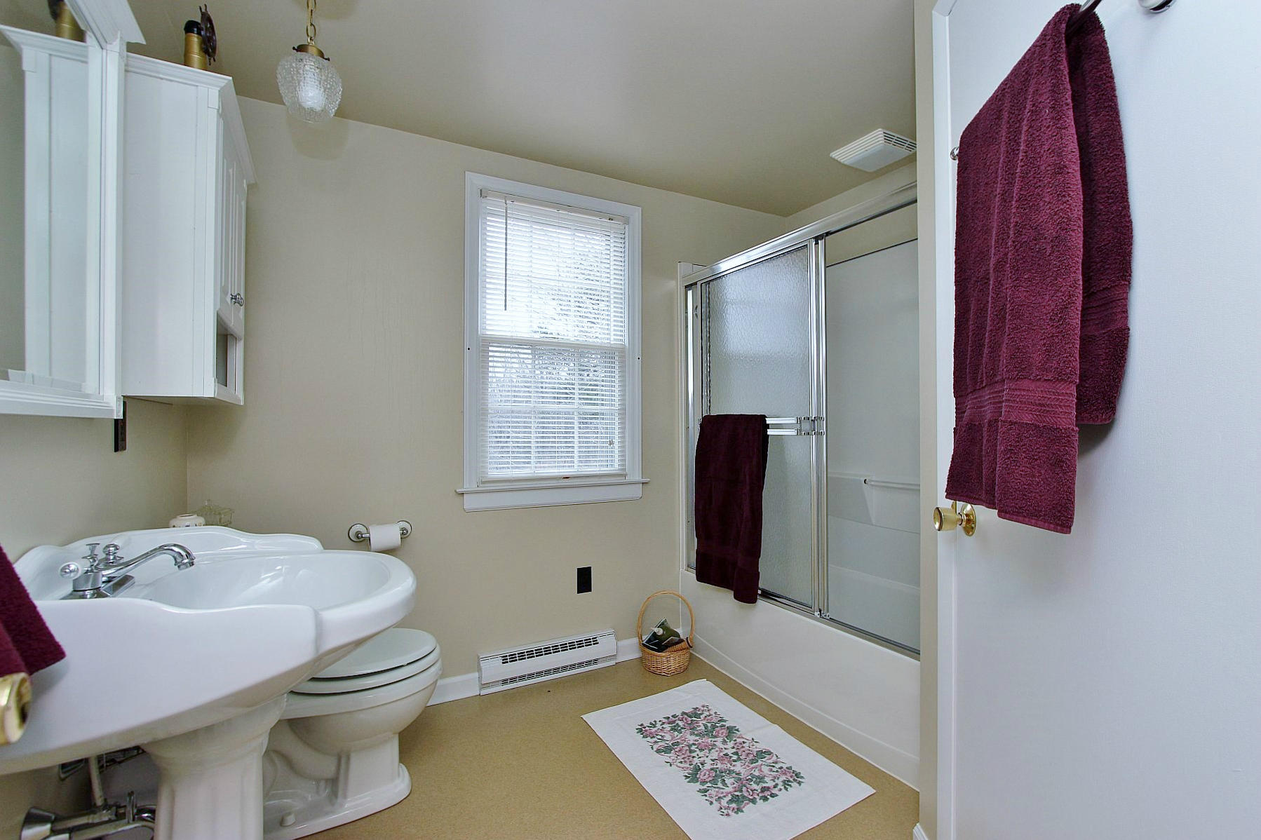 1131 Quarles Road Thaxton, VA 24174 - Photo 50 of 58 a bathroom with a sink and a mirror