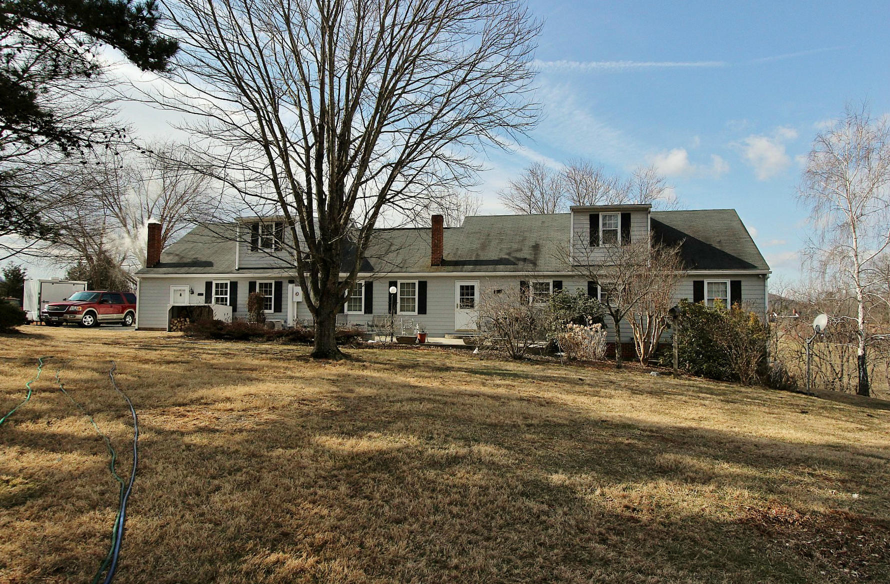 1131 Quarles Road Thaxton, VA 24174 - Photo 10 of 58 a front view of a house with a yard