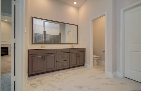 a view of a hallway with a chandelier