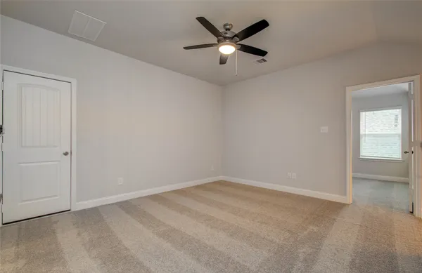 a view of a house with backyard and porch
