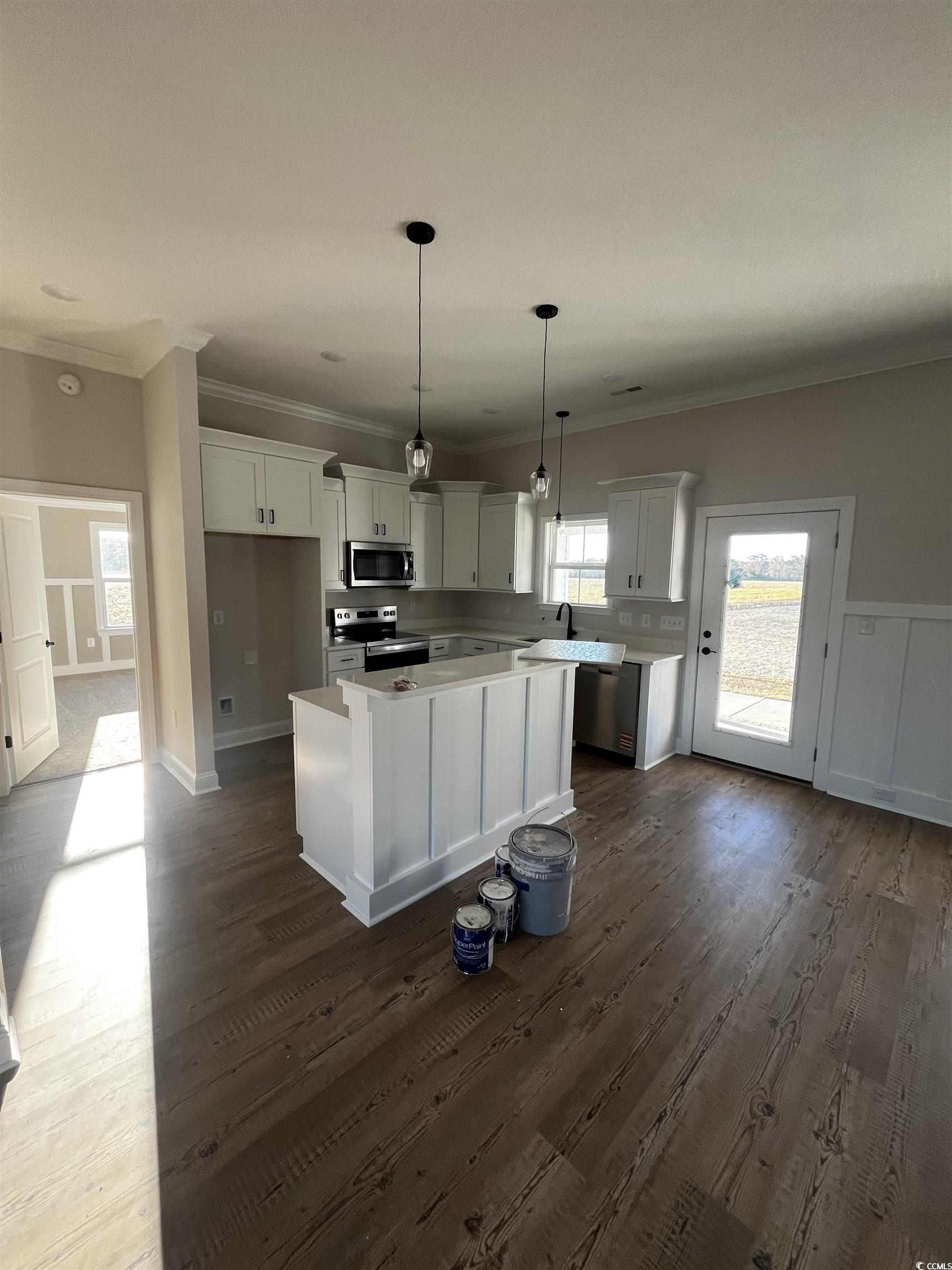 3448 Asbury Road Aynor, SC 29511 - Photo 3 of 7 Kitchen with a kitchen island, white cabinetry, da