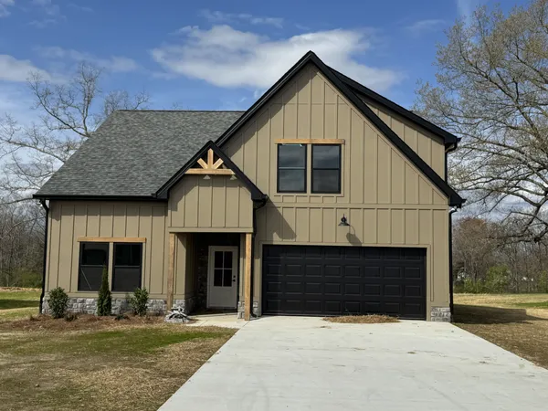 wooden floor in an empty room with a fireplace