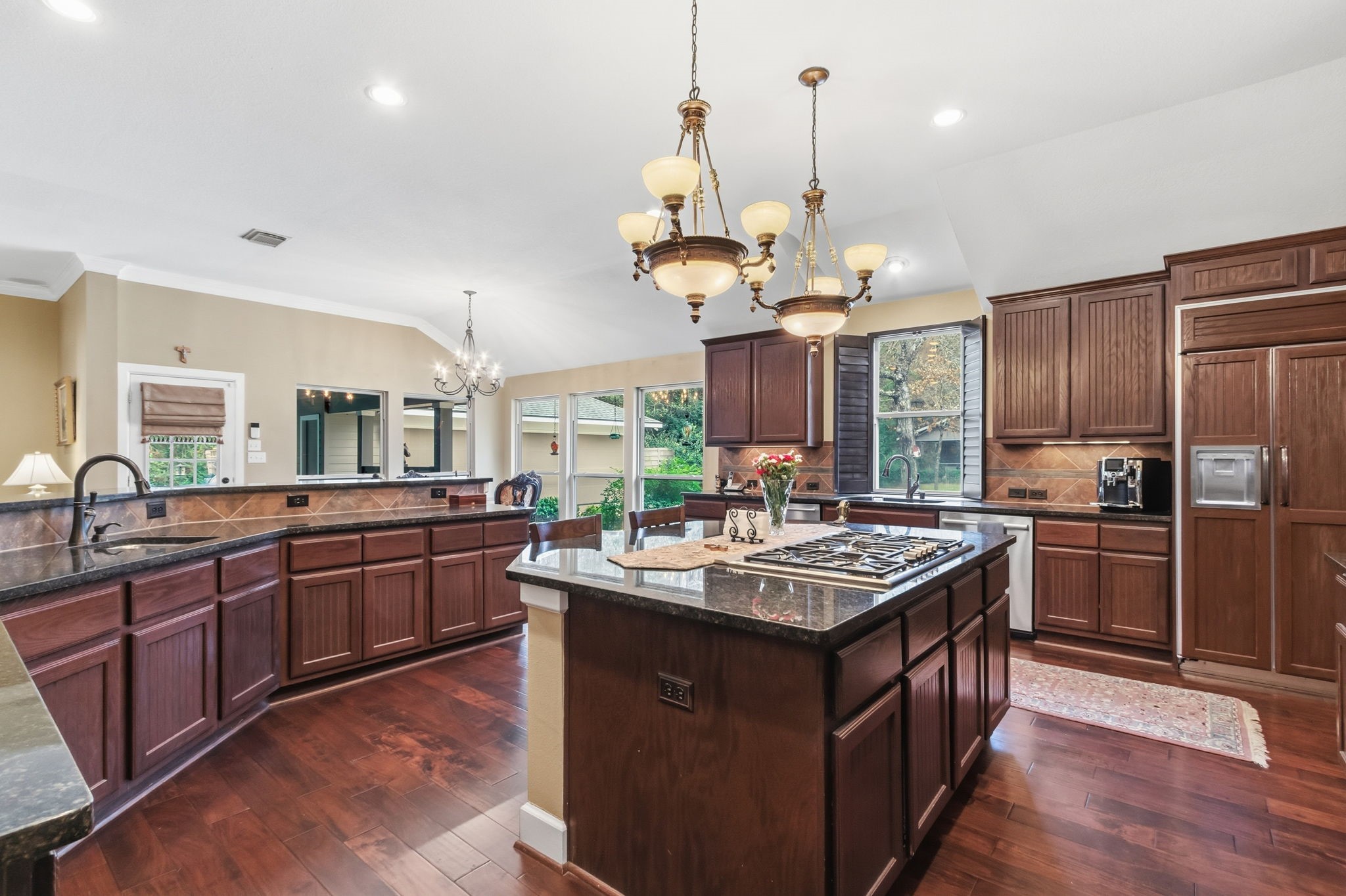 7514 Saddle Blanket Drive Waller, TX 77484 - Photo 19 of 50 Abundant custom cabinets that features elegant beaded board fronts, enhances your kitchen storage and adds plenty of style to the kitchen.