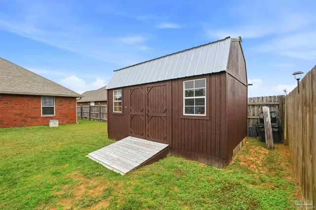 a view of a backyard with a garden