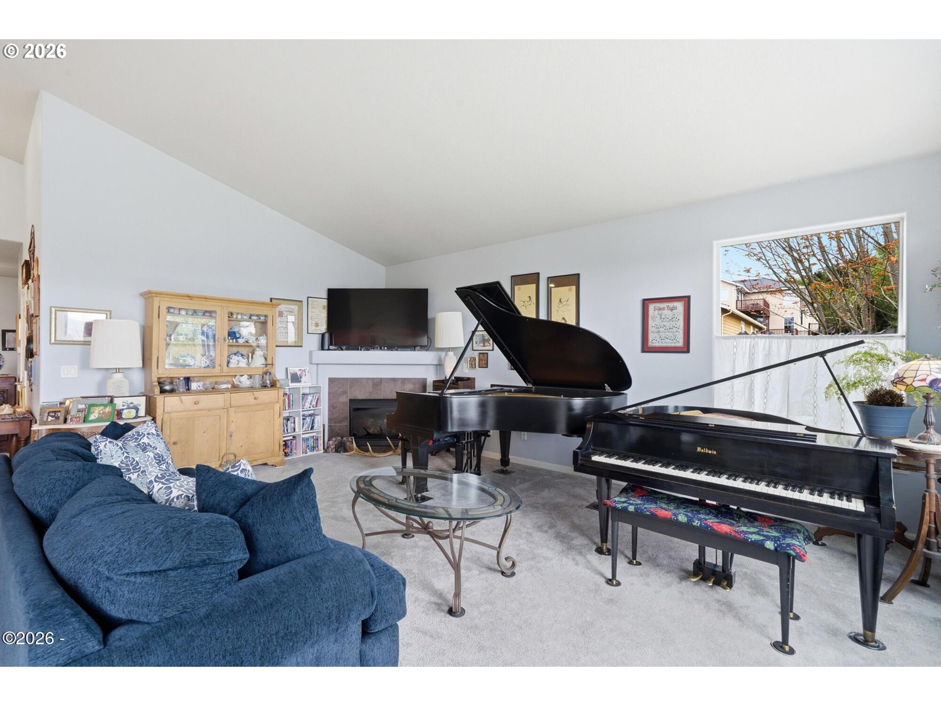 4365 Sequoia Loop Netarts, OR 97141 - Photo 11 of 44 a living room with furniture and a piano
