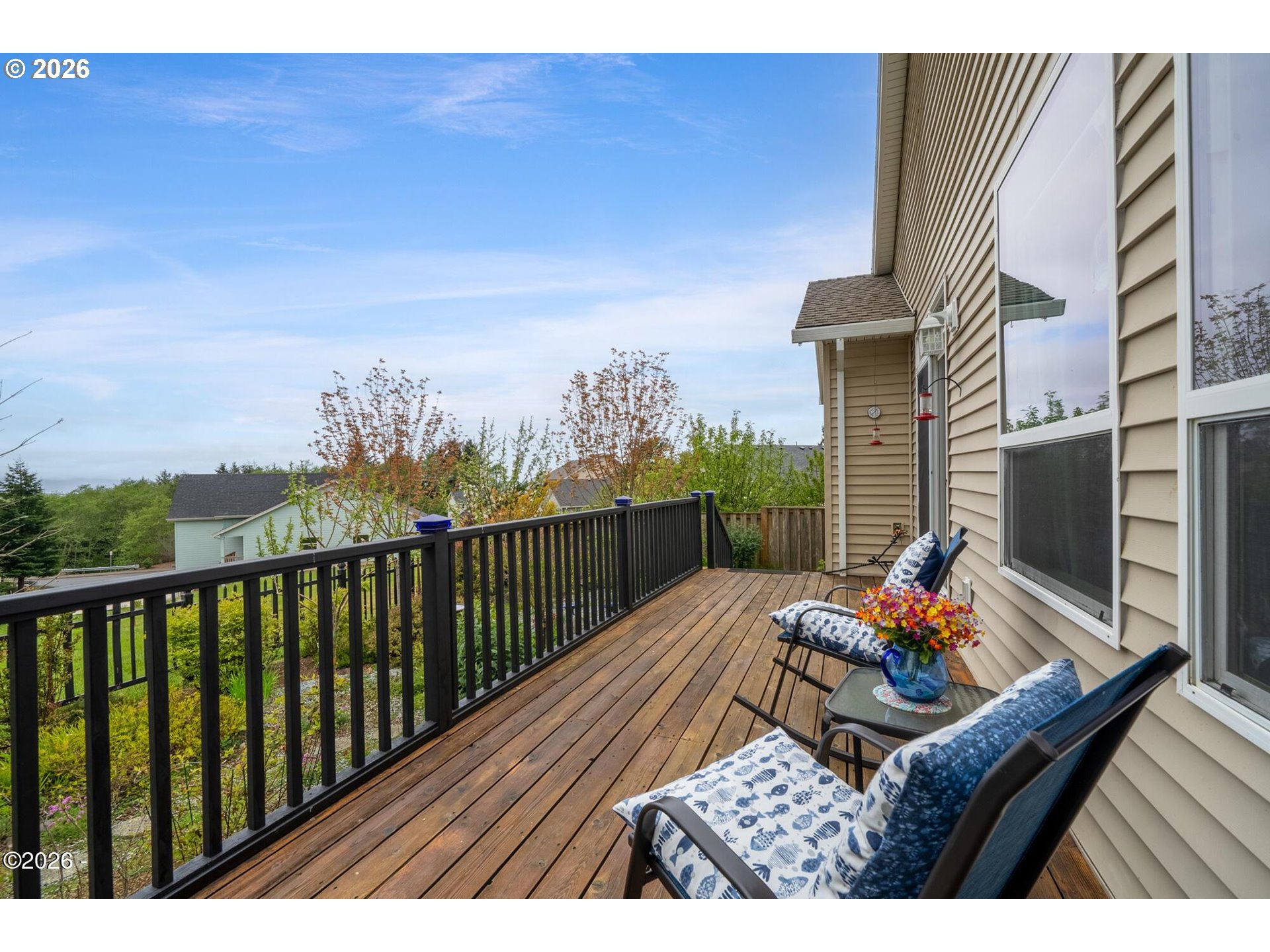 4365 Sequoia Loop Netarts, OR 97141 - Photo 16 of 44 a view of a balcony with furniture