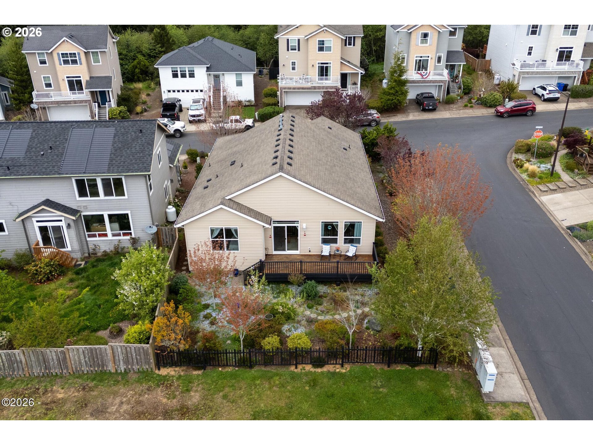 4365 Sequoia Loop Netarts, OR 97141 - Photo 20 of 44 a aerial view of a house with a garden and plants