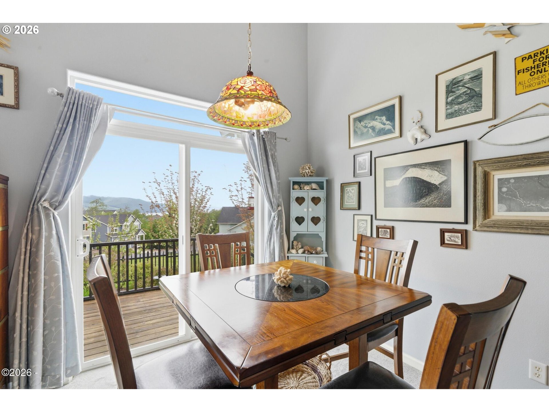 4365 Sequoia Loop Netarts, OR 97141 - Photo 21 of 44 a view of a dining room with furniture window and outside view