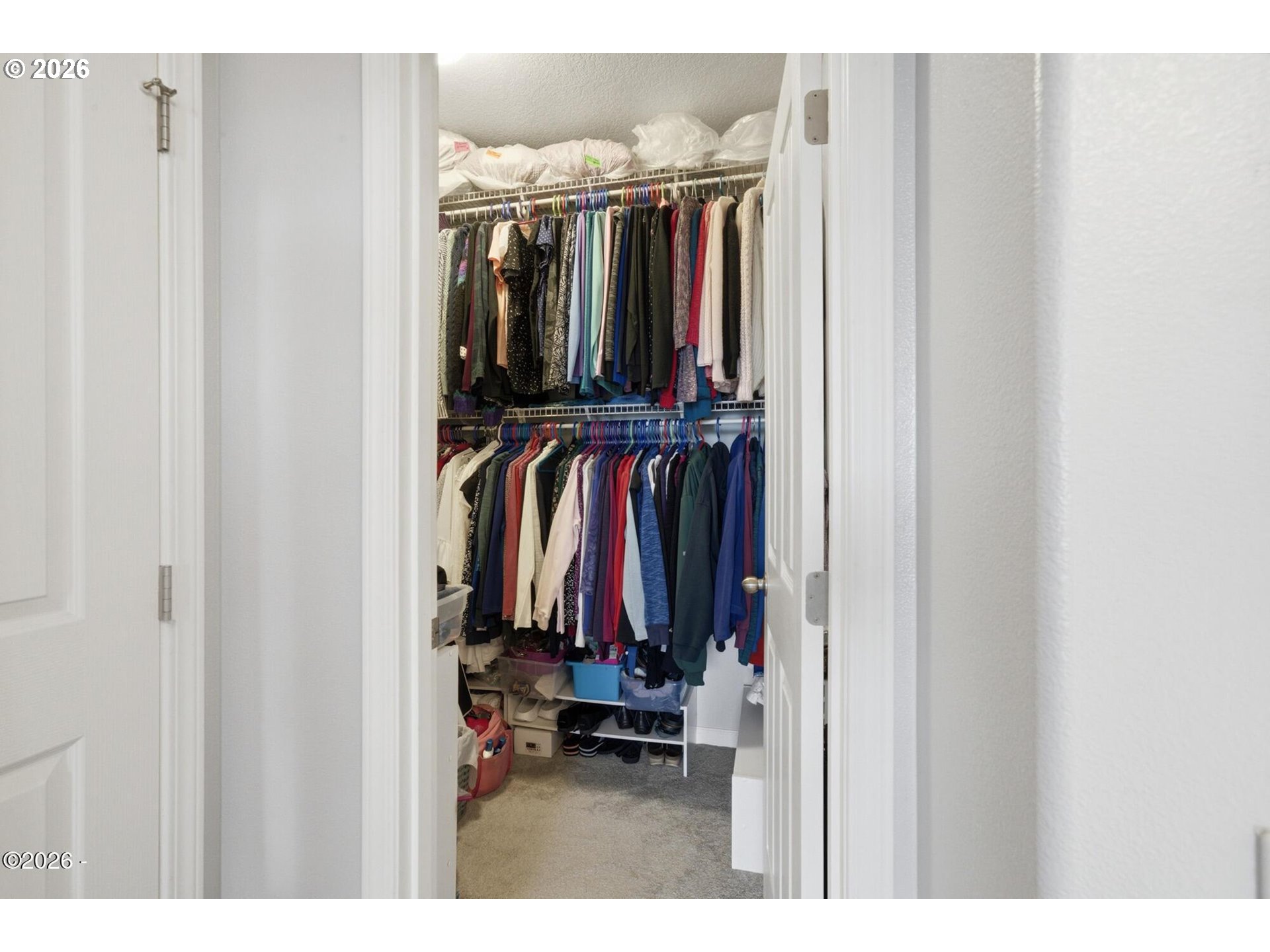 4365 Sequoia Loop Netarts, OR 97141 - Photo 27 of 44 a view of walk in closet with clothes