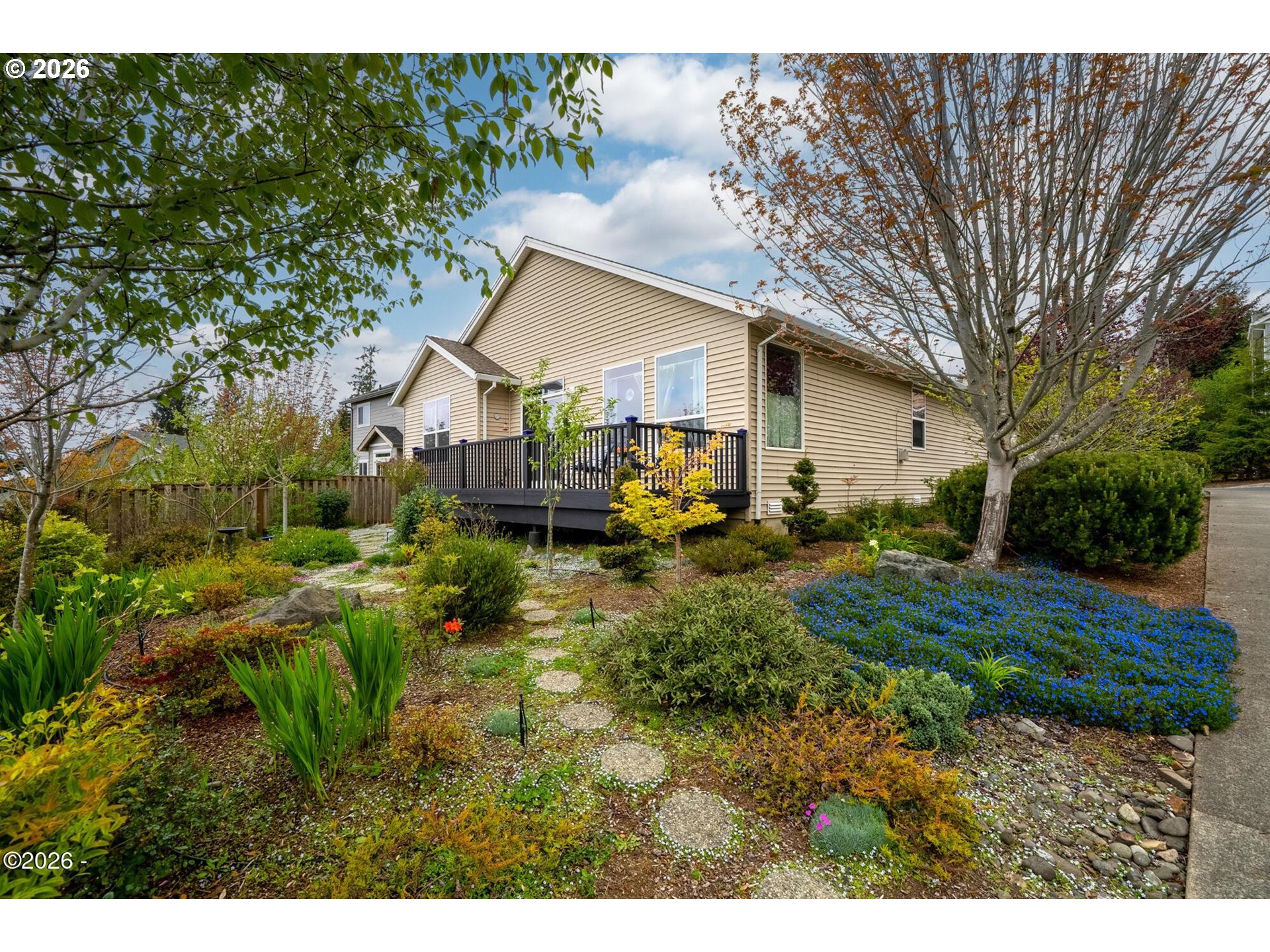 4365 Sequoia Loop Netarts, OR 97141 - Photo 32 of 44 a view of a house with backyard and garden