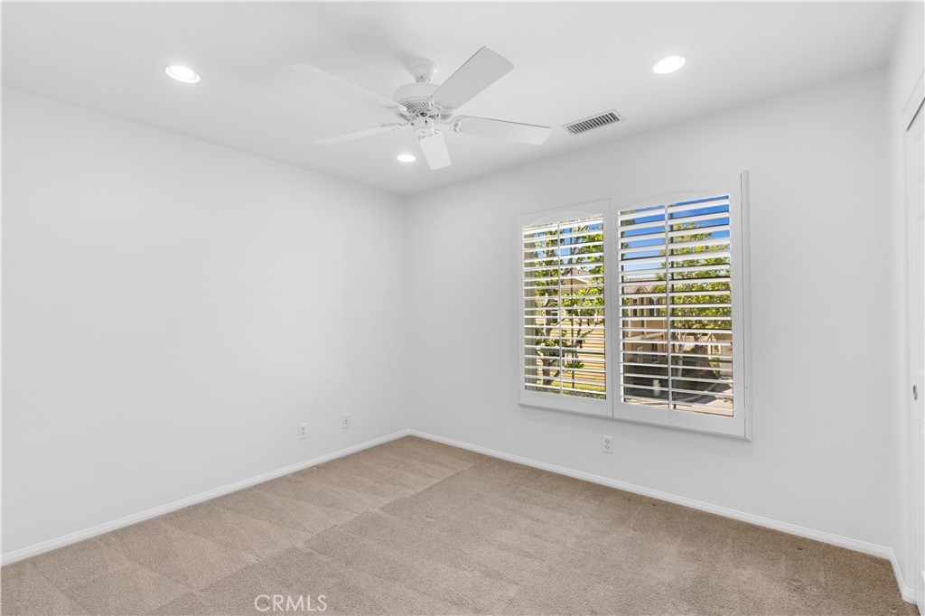 9 Fieldhouse Ladera Ranch, CA 92694 - Photo 21 of 33 Upstairs bedroom with recessed lighting + ceiling fan