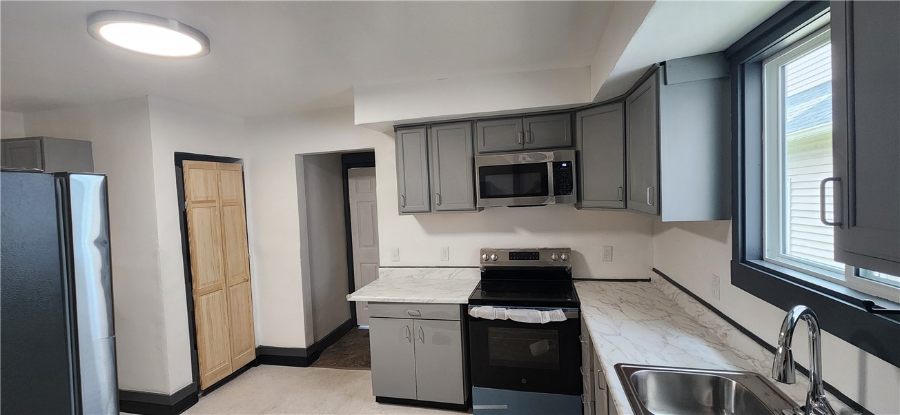 216 Lyndhurst Street Rochester, NY 14605 - Photo 5 of 13 Kitchen