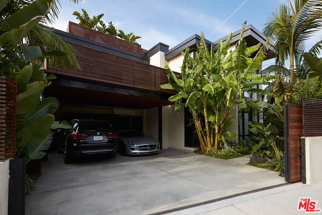 a car parked in front of a house