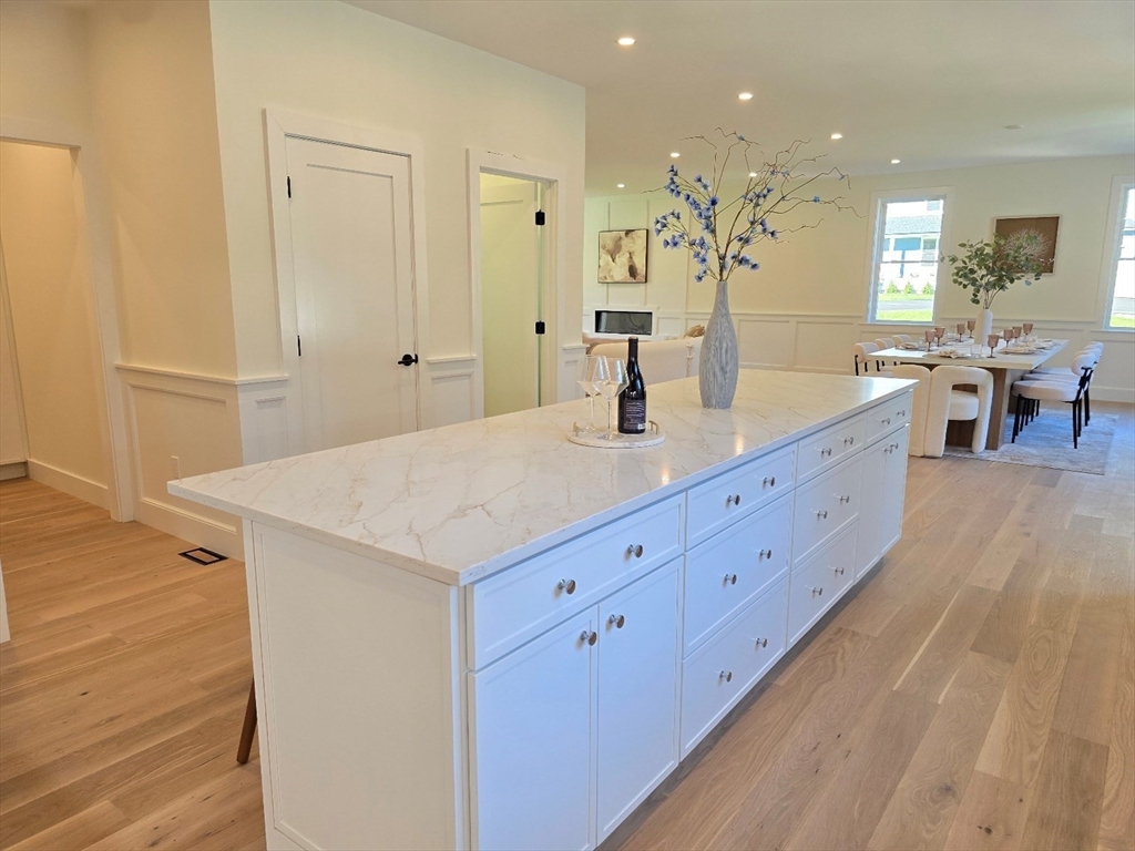 1 Danforth Drive Holliston, MA 01746 - Photo 12 of 42 a spacious bathroom with a granite countertop sink a mirror and shower