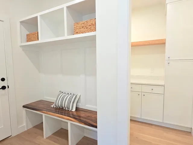 a view of a hallway with front door