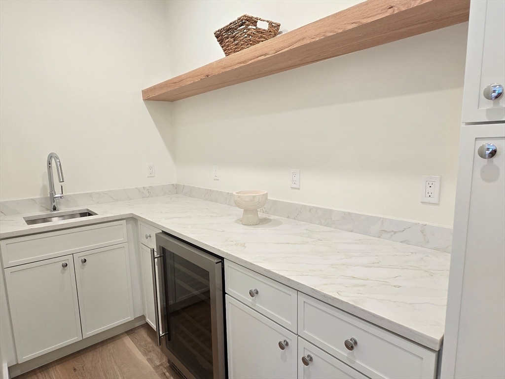 1 Danforth Drive Holliston, MA 01746 - Photo 16 of 42 a bathroom with a sink and a mirror