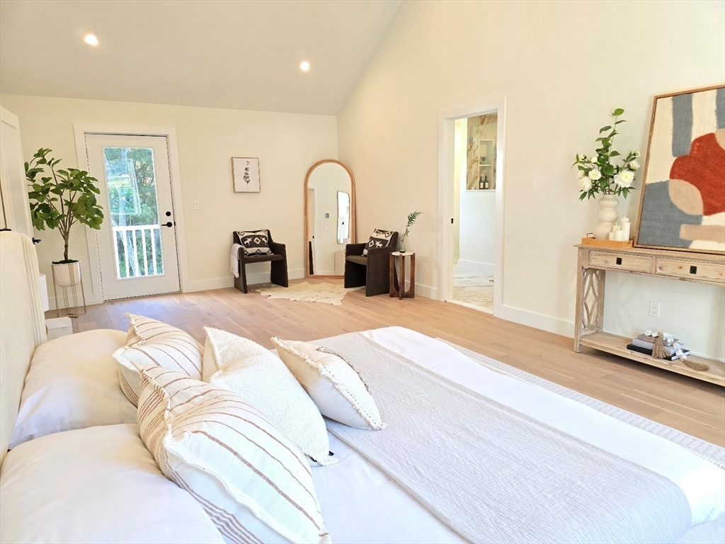 1 Danforth Drive Holliston, MA 01746 - Photo 22 of 42 a bedroom with a large bed and a large window