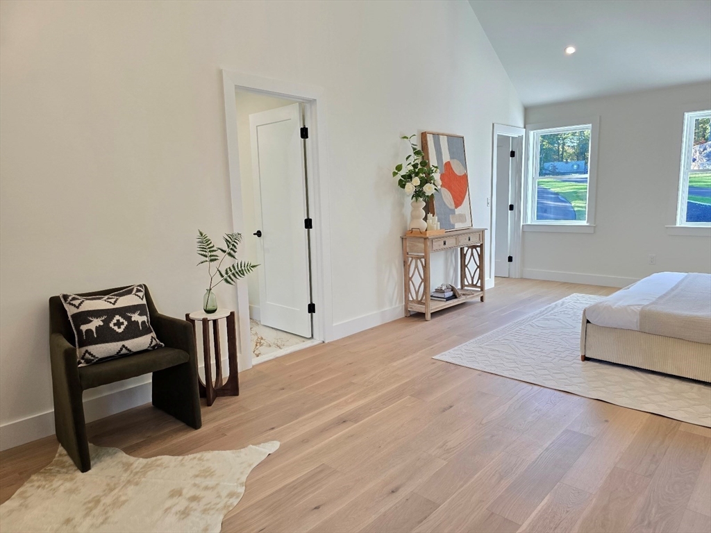 1 Danforth Drive Holliston, MA 01746 - Photo 24 of 42 a living room with furniture and a wooden floor