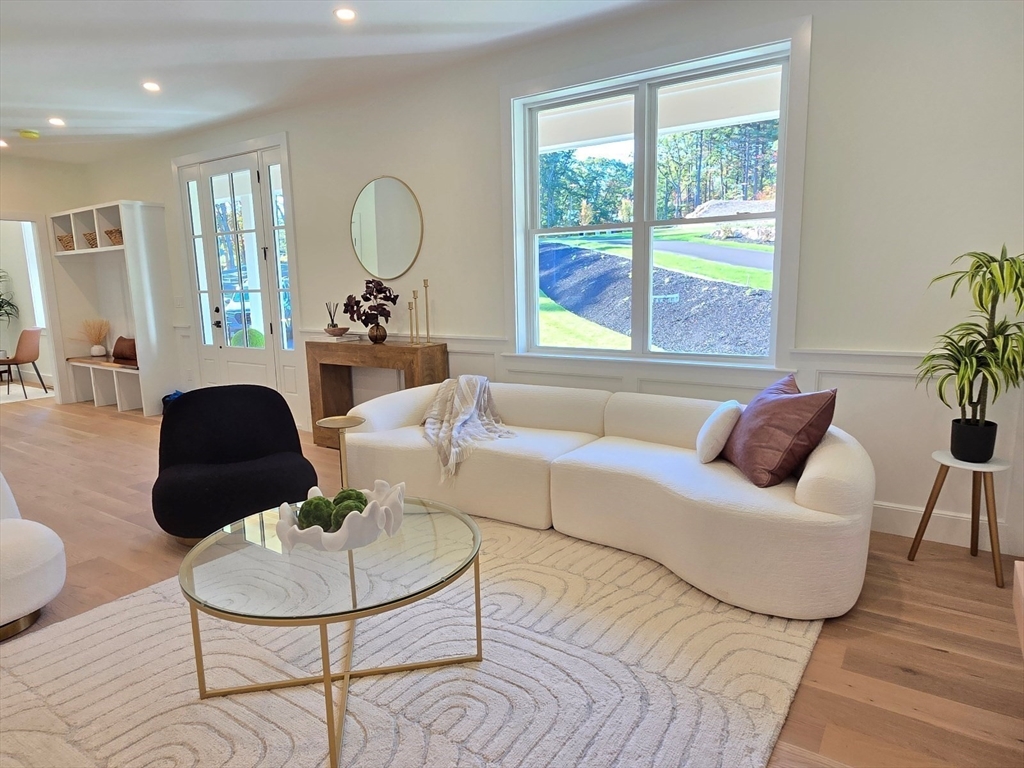 1 Danforth Drive Holliston, MA 01746 - Photo 5 of 42 a living room with furniture potted plant and a large window