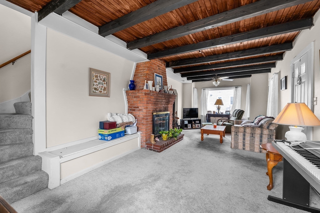 22 12th Road Marshfield, MA 02050 - Photo 12 of 42 a view of living room with furniture and a ceiling fan