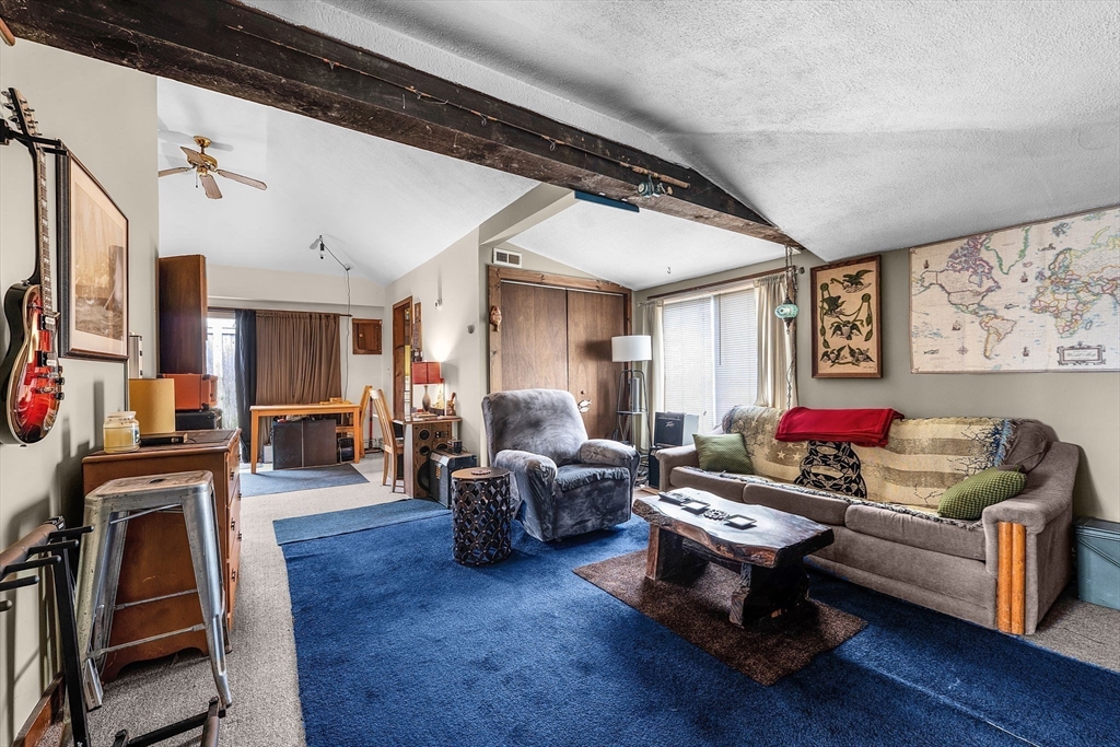 22 12th Road Marshfield, MA 02050 - Photo 25 of 42 a living room with furniture and a flat screen tv