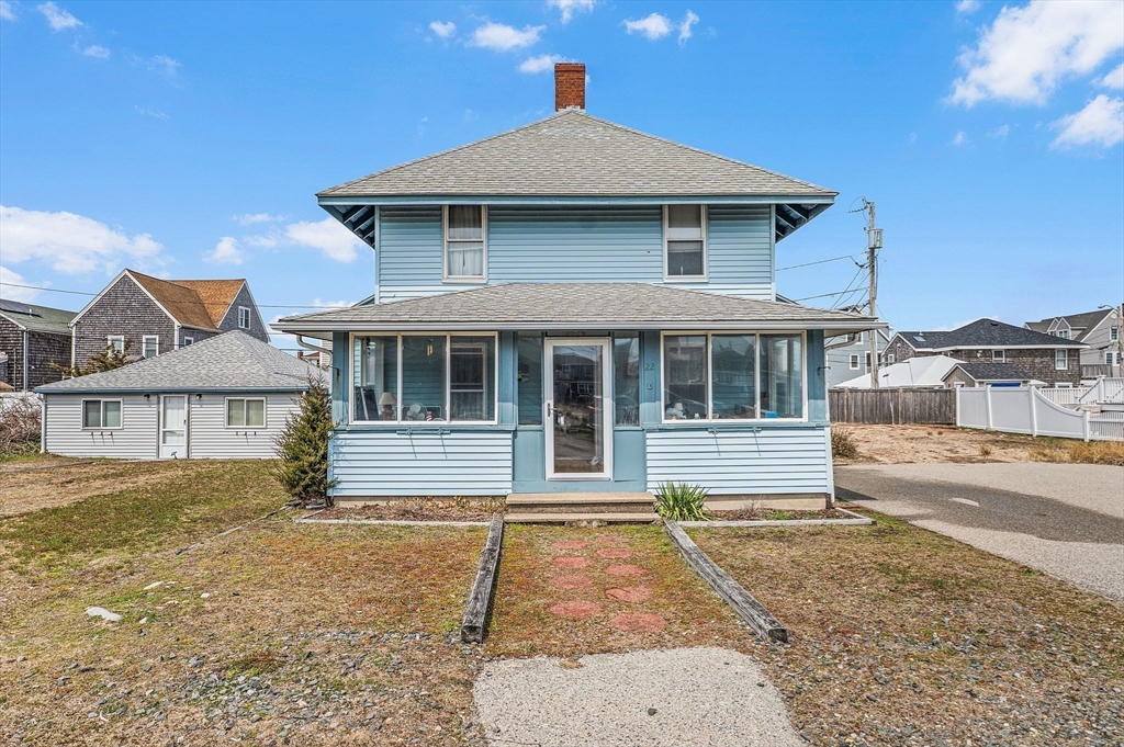 22 12th Road Marshfield, MA 02050 - Photo 3 of 42 a front view of a house with a yard