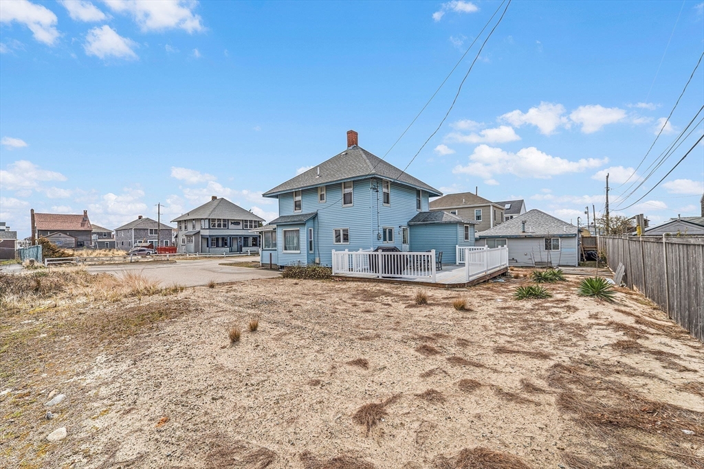 22 12th Road Marshfield, MA 02050 - Photo 32 of 42 a view of house with wooden deck and living room