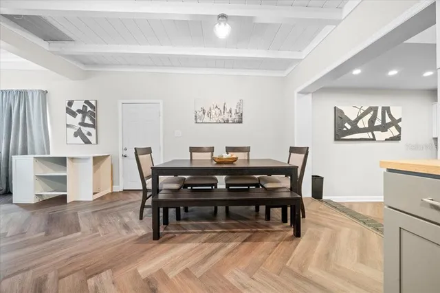 a view of a dining room with furniture