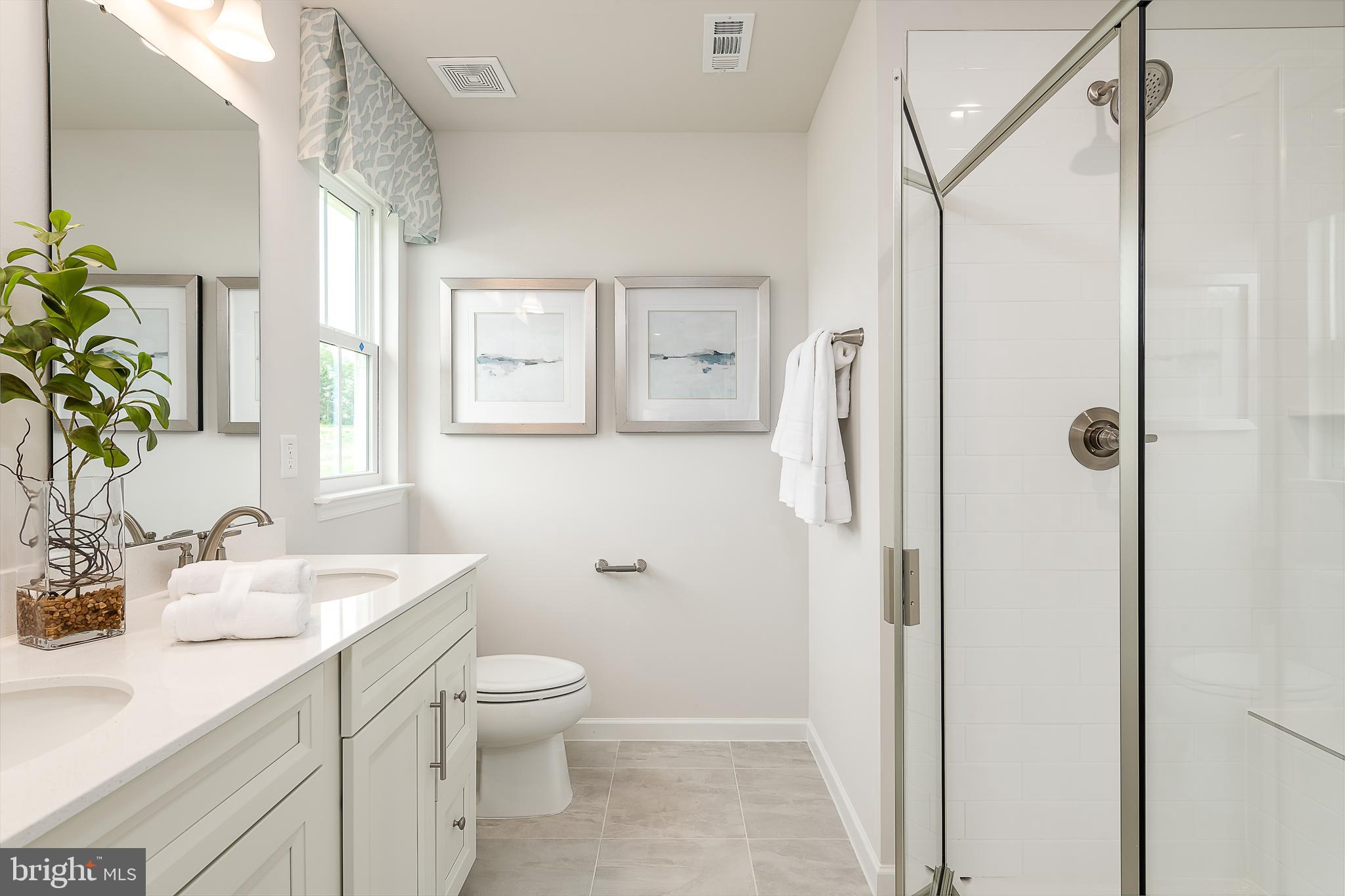 19 Wallace Way Ranson, WV 25438 - Photo 18 of 23 a bathroom with a sink toilet and shower