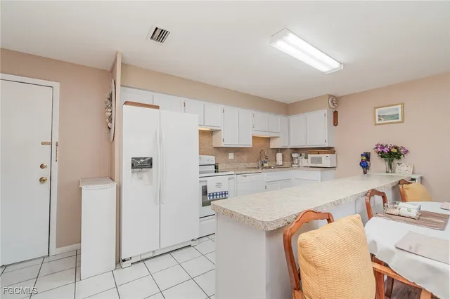$182,000 | 4802 Tudor Drive, Unit 201, Cape Coral, FL 33904