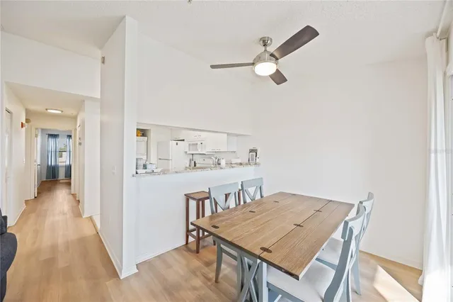 a very nice looking dining room with a table and chairs