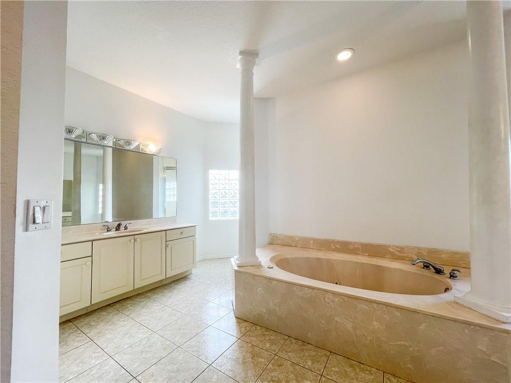 6150 Hancock Road Southwest Ranches, FL 33330 - Photo 30 of 41 a bathroom with a bathtub and a sink