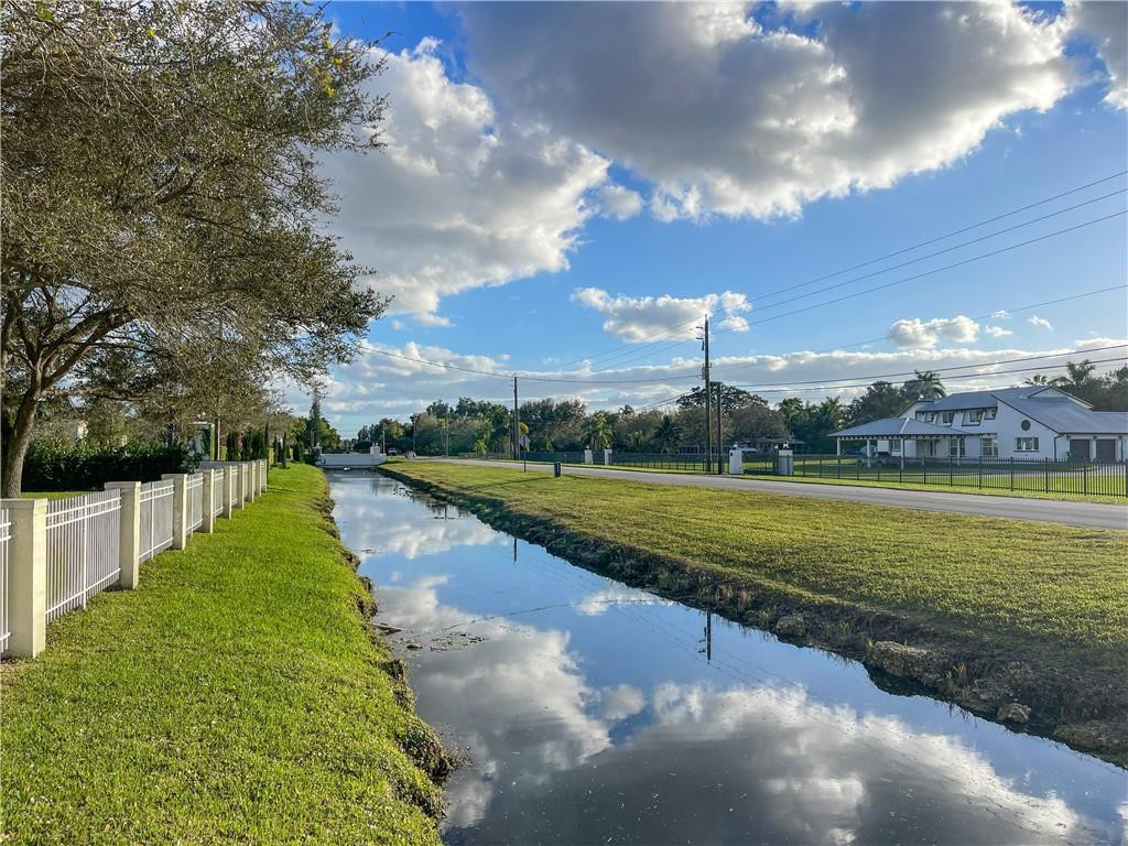 6150 Hancock Road Southwest Ranches, FL 33330 - Photo 38 of 41 a view of a lake with a big yard