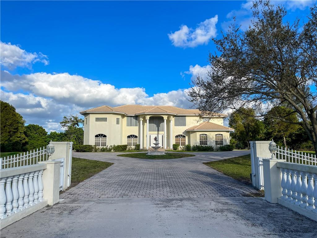 6150 Hancock Road Southwest Ranches, FL 33330 - Photo 41 of 41 a view of a house with a yard