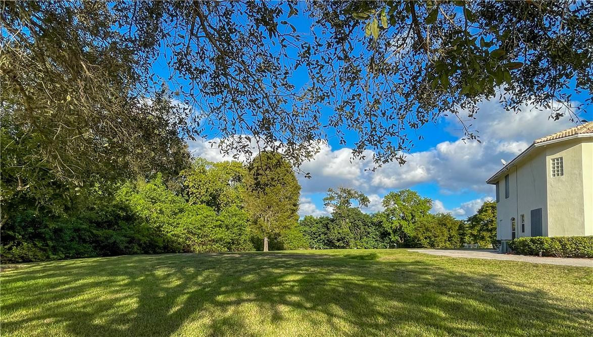 6150 Hancock Road Southwest Ranches, FL 33330 - Photo 8 of 41 a backyard of a house with lots of green space