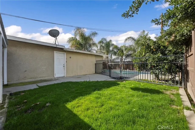 a view of a backyard with a garden