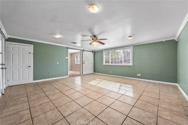 a view of an empty room and window