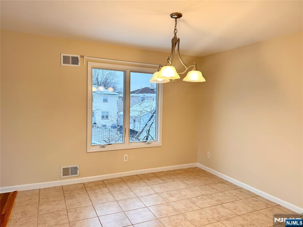 57 Franklin Street, Unit 2 Elmwood Park, NJ 07407 - Photo 9 of 19 a view of a room with window