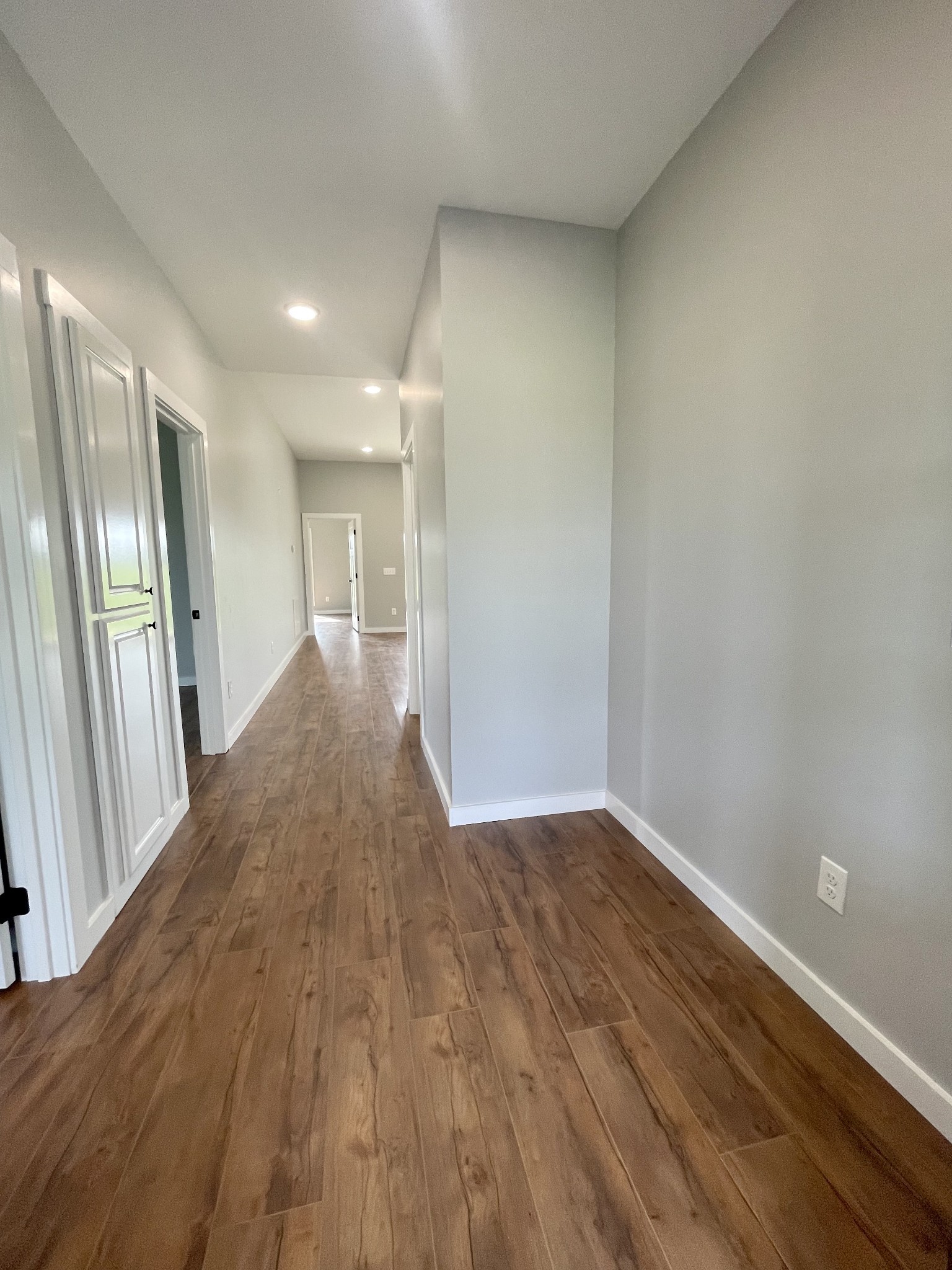 1448 Fall River Road Lawrenceburg, TN 38464 - Photo 15 of 30 a view of a hallway with wooden floor