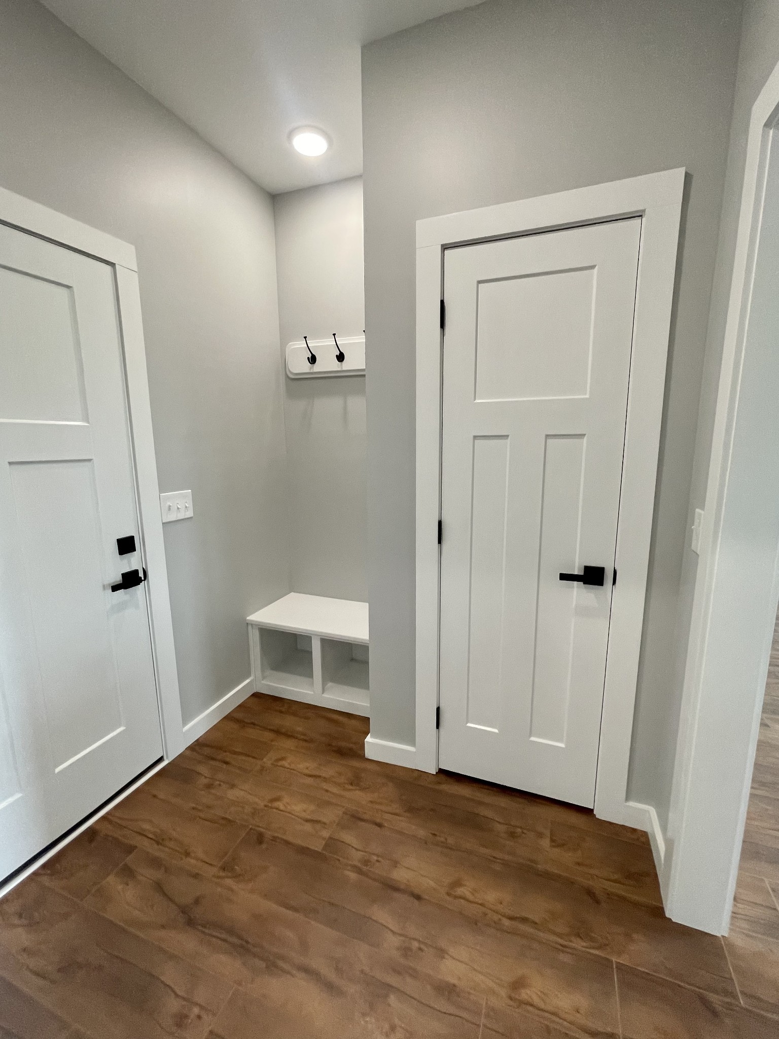1448 Fall River Road Lawrenceburg, TN 38464 - Photo 17 of 30 an empty room with wooden floor and cabinet