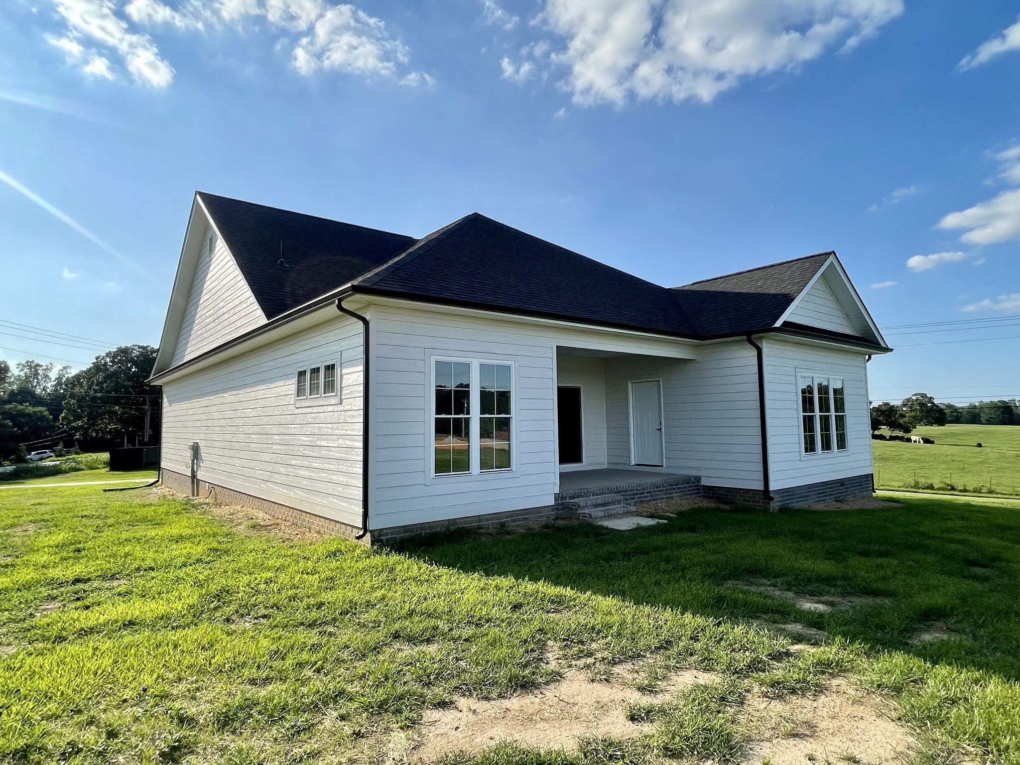 1448 Fall River Road Lawrenceburg, TN 38464 - Photo 23 of 30 a front view of house with yard and green space