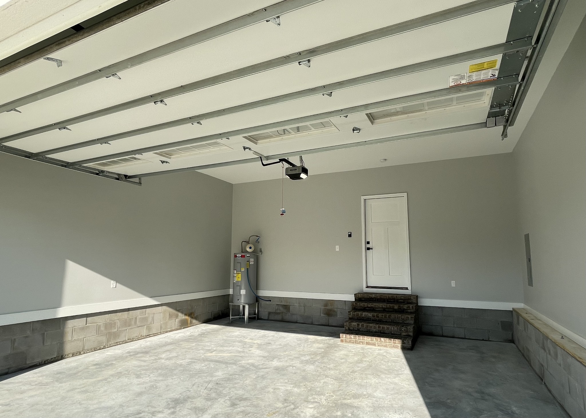 1448 Fall River Road Lawrenceburg, TN 38464 - Photo 26 of 30 a bedroom with a bed and a ceiling fan