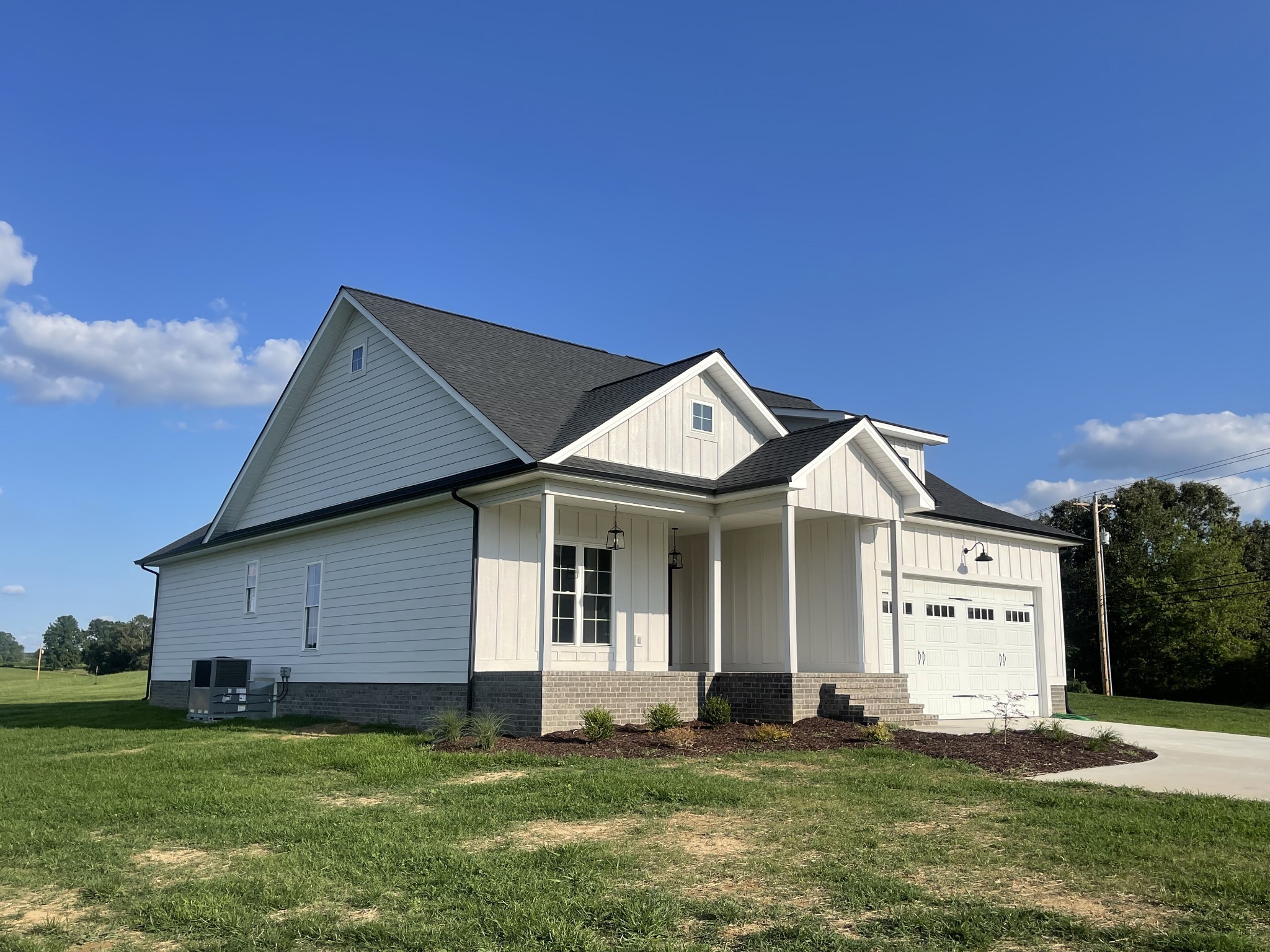 1448 Fall River Road Lawrenceburg, TN 38464 - Photo 30 of 30 a big house with a big yard and more windows