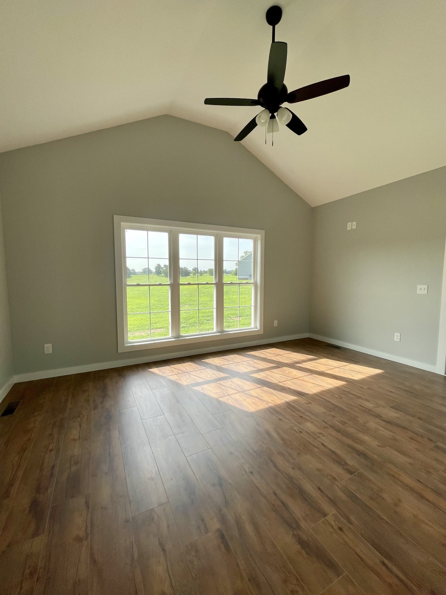 1448 Fall River Road Lawrenceburg, TN 38464 - Photo 9 of 30 a view of an empty room with a window