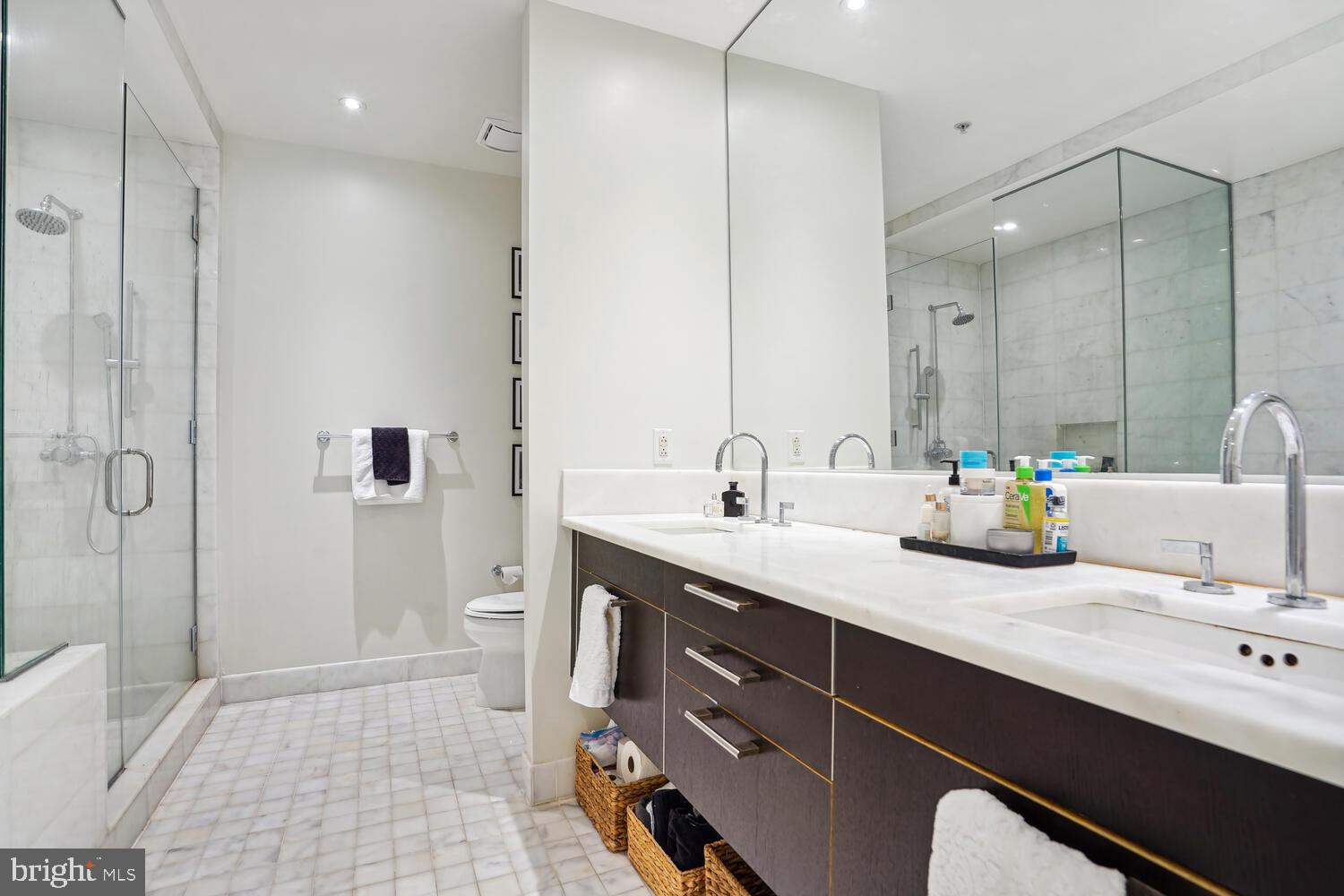 3303 Water Street Northwest, Unit 3L Washington, DC 20007 - Photo 27 of 40 Primary ensuite marble bath w/a double vanity