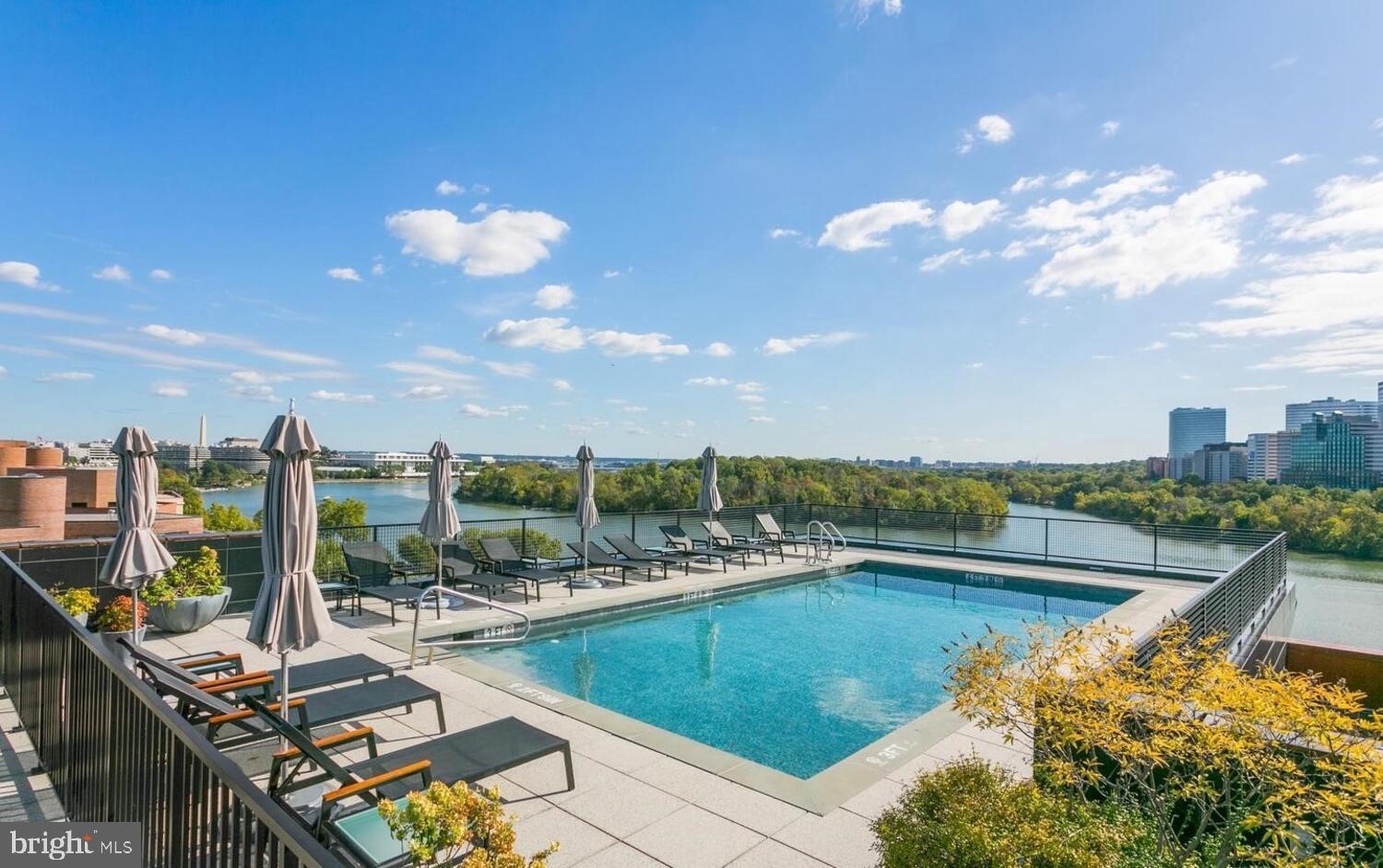 3303 Water Street Northwest, Unit 3L Washington, DC 20007 - Photo 33 of 40 Impeccable & iconic views from the rooftop pool
