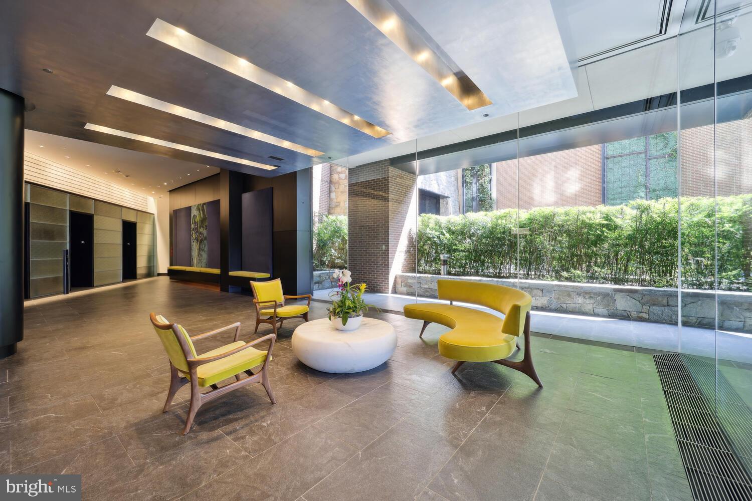 3303 Water Street Northwest, Unit 3L Washington, DC 20007 - Photo 6 of 40 Grand modern lobby w/24 hour Concierge